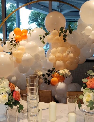 orange dinner yourstyle2be balloon and flower deisgn in broward county